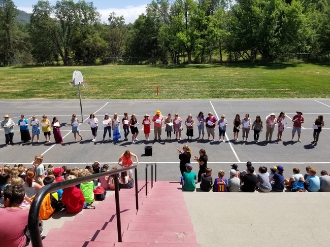 a group of people gather to prepare for a walk