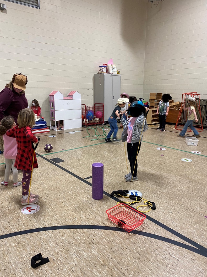 kids playing in an indoor gym