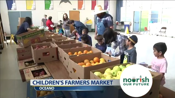 table with boxes of produce on it