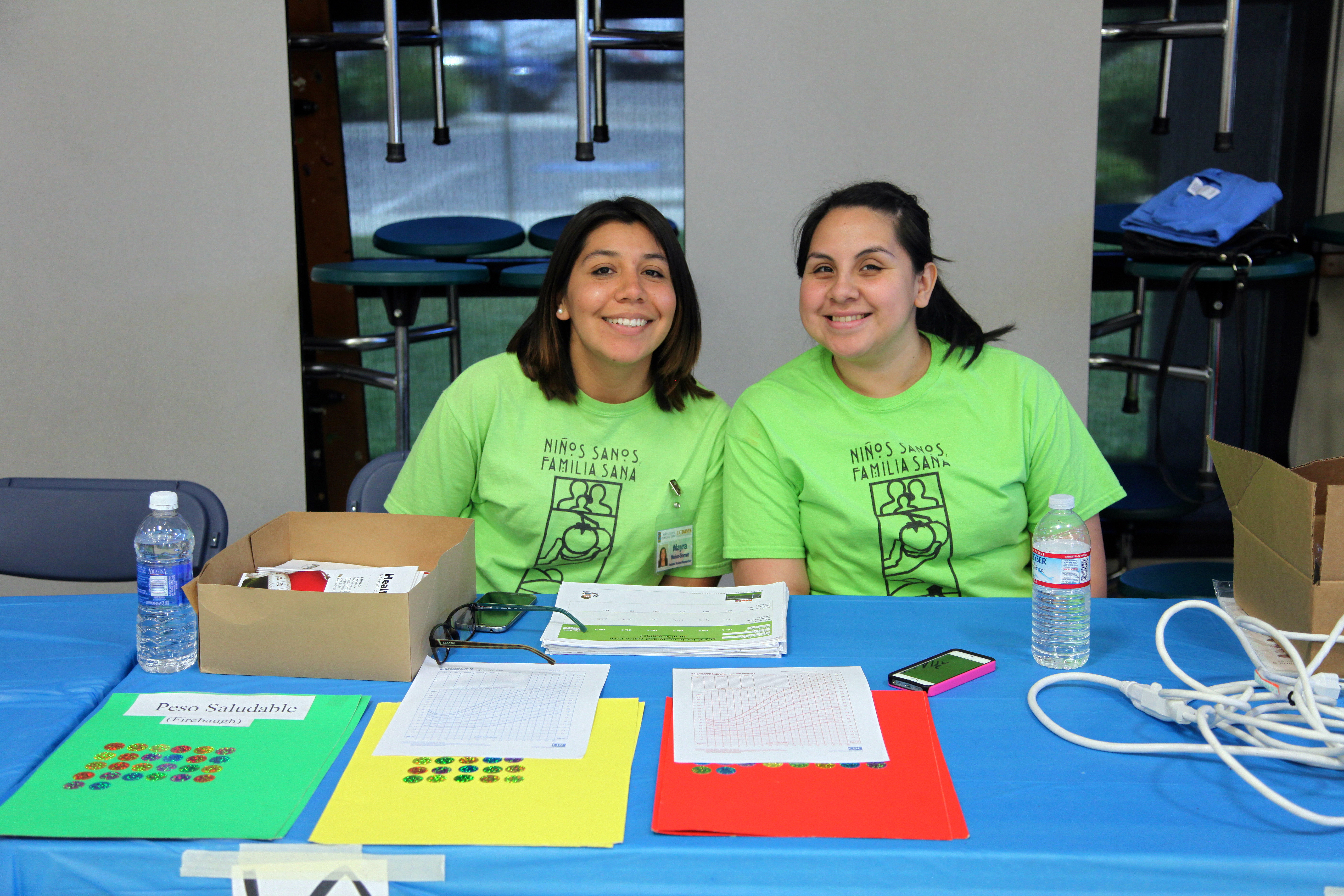 two adults sitting at a table