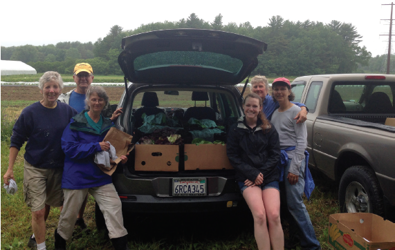 photo gleaners with their produce.