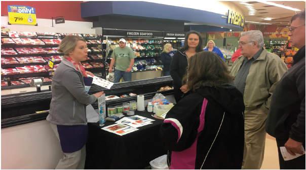 photo of nutrition education in a grocery store