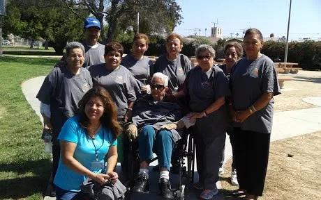 walking group posing for a photo