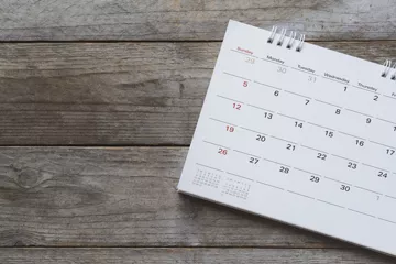 calendar on a wooden background