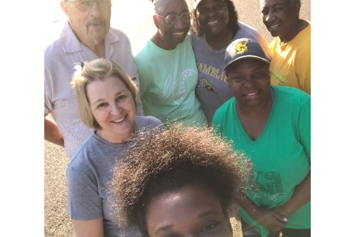 group of adults get ready for a community walk