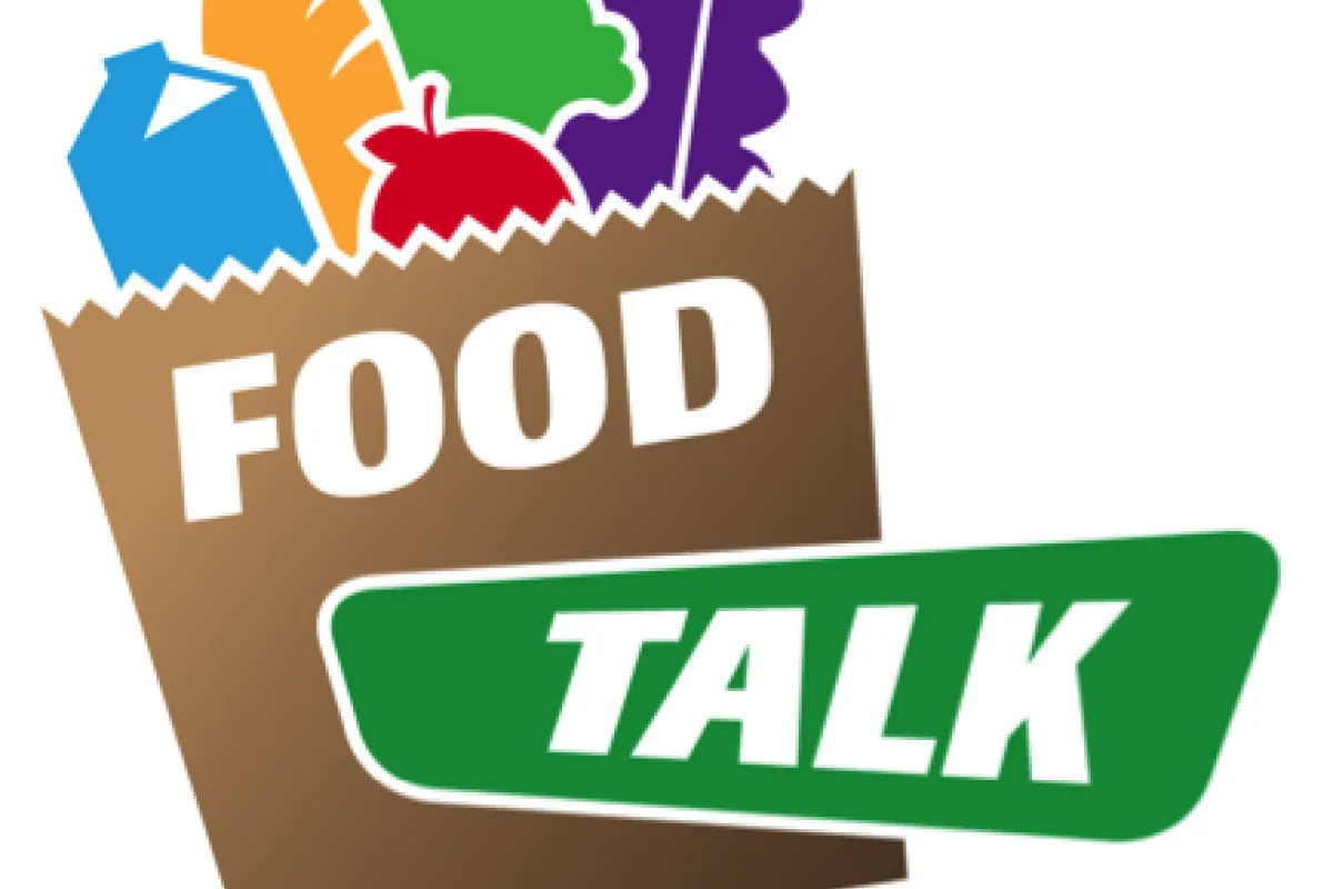 Food Talk Logo cartoon picture of a grocery bag with food