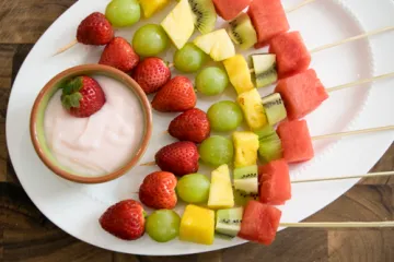 fruit kabobs on a plate