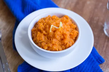 mashed sweet potatoes with lemon zest on top