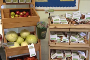 fruits and vegetables on a stand