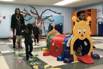 Indoor playground with kids playing
