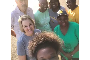 group of adults get ready for a community walk