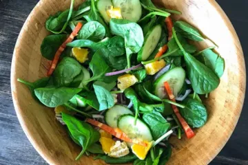 salad in a wooden salad bowl