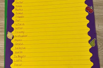 1st Grade 2-Bite Club on yellow background with a purple boarder; names written on each line down the page