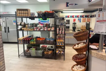 Shelf of dry goods at a food pantry