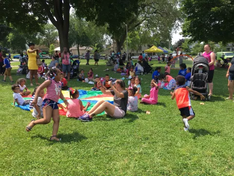 kids playing on a grassy area