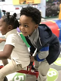 kids playing in indoor playground