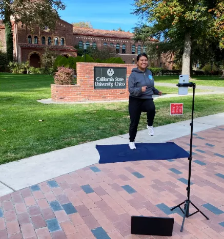 Woman leading virtual physical activity class