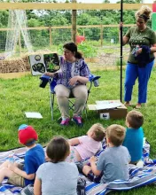 An educator teaches Growing Healthy Habits to a group of children